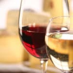 Red and White wine in clear stemmed glasses
