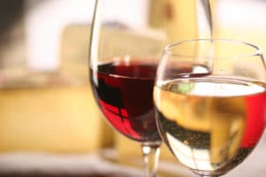 Red and White wine in clear stemmed glasses