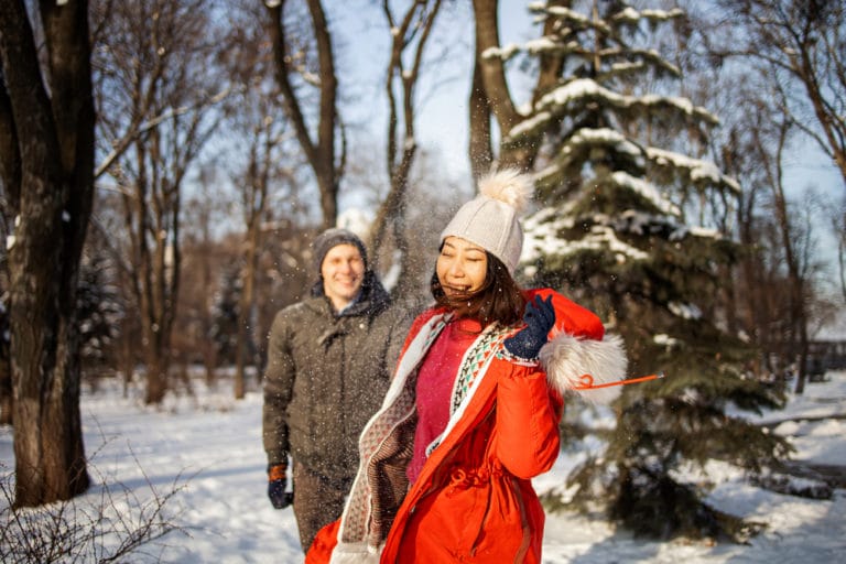 Our Blog 13 Couple playing in the snow at Finger Lakes National Forest